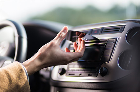 Listen to music CDs while you drive